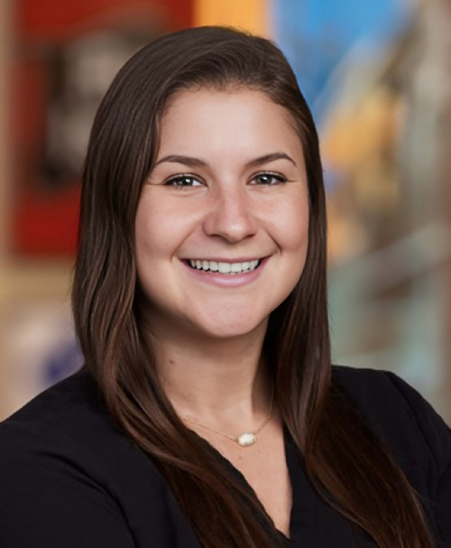 Dr. Lilly Poor, dentist at Northglenn dental practice, smiling headshot.